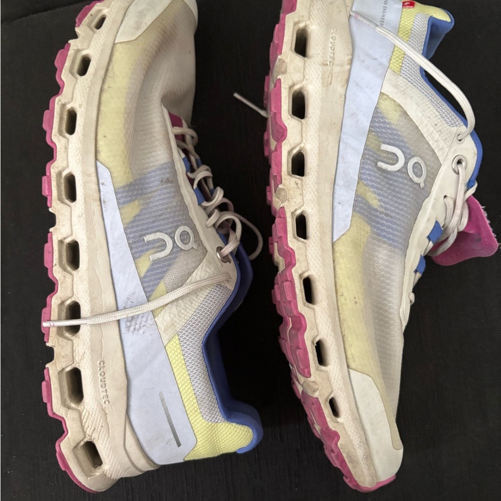 On Running Pink and Blue Athletic Shoes with Modern Silhouette